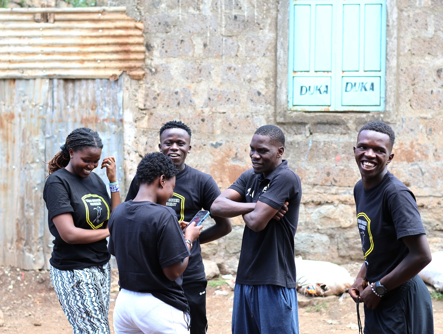team members of teds community hub gathering outside their library 5m1a2700